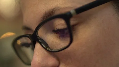 Close up profile of attractive cool redhead woman with glasses reflection, Stock Footage 111896933