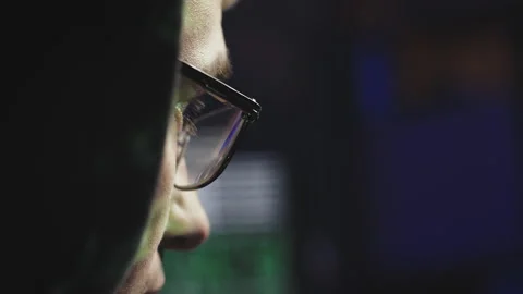 Close-up profile of a hacker Stock Footage 179510312
