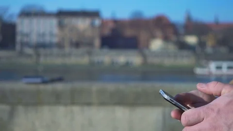 Close up of profile man's hands writing message on smartphone, close slider shot Vidéo 73066420