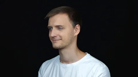 Close up profile view of happy young caucasian blonde man smiling. Portrait m Stock Footage 112395973