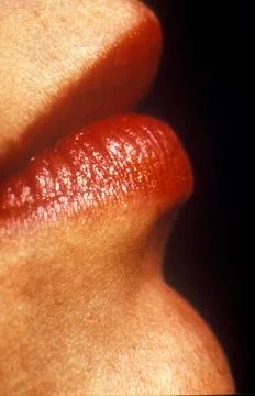 Close-up profile of a womans lips Stock Photos
