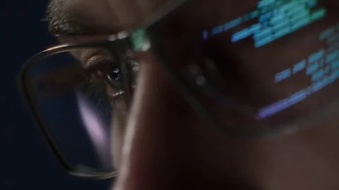 Close-up of programmer with code reflection Stock Footage 303998440