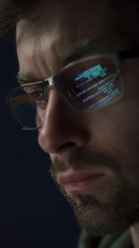 Close-up of programmer with code reflection in glasses Stock Footage 314259650