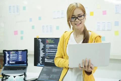 Close up programmer is coding and programming software. Stock Photos