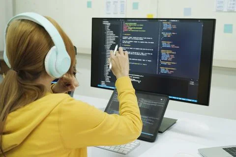 Close up programmer is coding and programming software. Stock Photos