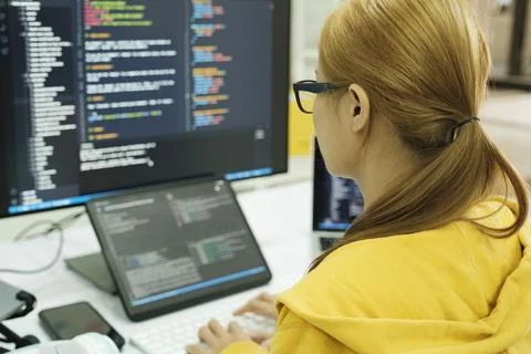 Close up programmer is coding and programming software. 库存照片