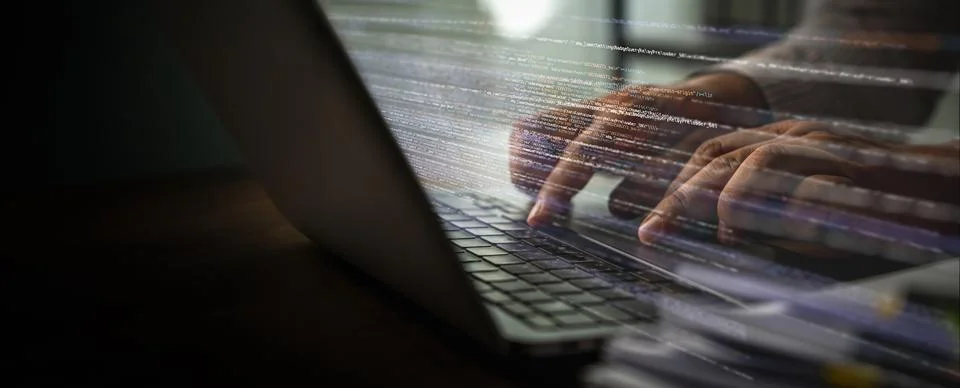 Close-up programmer coding hands on a computer development web types coding.. 스톡 사진