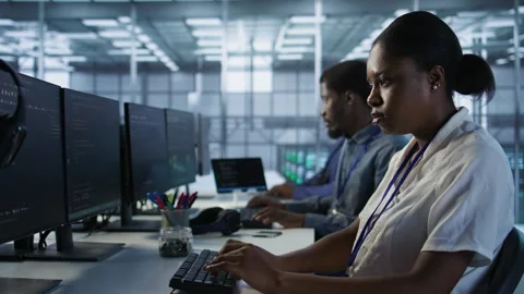 Close up of programmer in data center implementing AI systems Stock Footage 319528564
