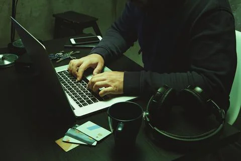 Close up of programmer of hacker hands typing a code Stock Photos