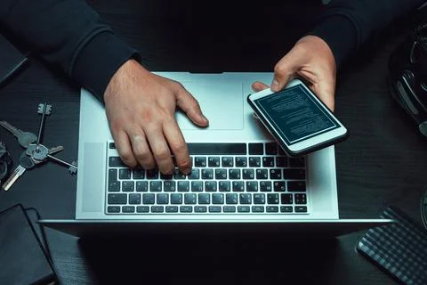 Close up of programmer of hacker hands typing a code 写真素材