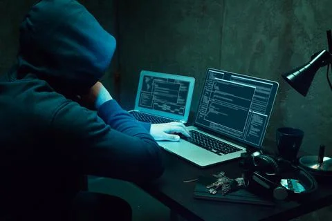 Close up of programmer of hacker hands typing a code 库存照片