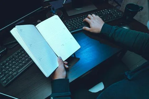 Close up of programmer of hacker hands typing a code Stock Photos