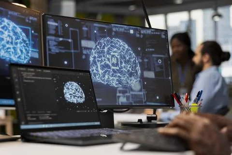 Close up of programmer in office integrating AI machine learning systems Stock Photos
