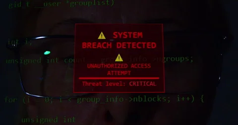 Close-up of a  programmer or data scientist wearing glasses analyzing code. Stock-Footage 331000194