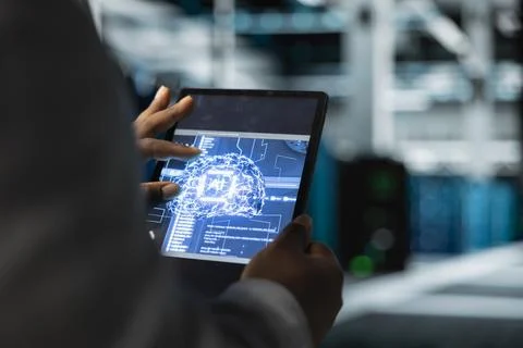 Close up of programmer using tablet in AI data center Stock Photos