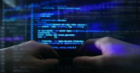 Close up of programmer's hands typing codes on keyboard with augmented holograms Stock Footage 153992353