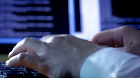 Close-up of programmer's hands typing on the keyboard Stock Footage 72467996
