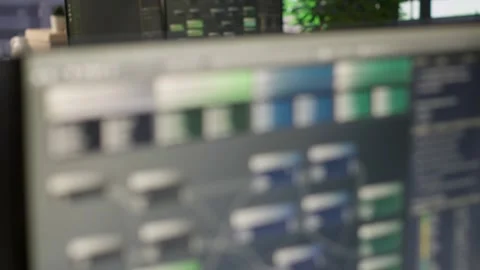 Close up of programming code on computer monitors in company workspace Stock Footage 318229597