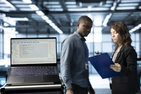 Close up of programming language on notebook display in server room Stock-Fotos
