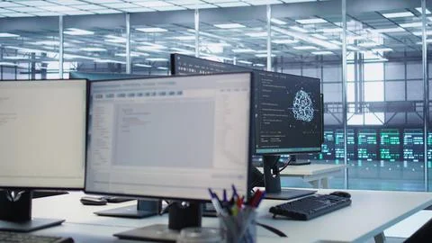 Close up of programming language on PC displays in AI server farm Stock Photos