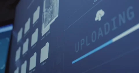 Close up on progress bar display on computer screen uploading secret files Vidéo 328543226