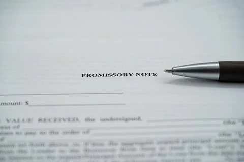 Close up of promissory note document with pen on financial agreement form Fotos de archivo