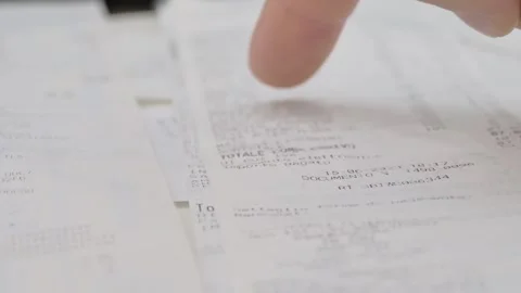 Close-up, proofreading paper check, many different checks Video stock 252022005