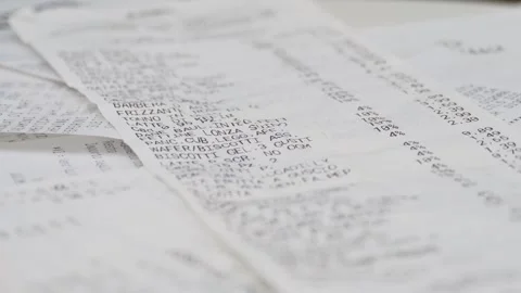 Close-up, proofreading paper check, many different checks Video stock 254344923