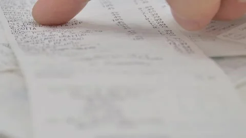 Close-up, proofreading paper check, many different checks Stock Footage 257220174