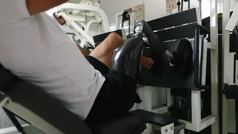 Close-up of prosthesis in action during a gym workout Stock Footage 276948053