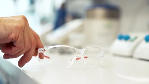 Close-up of protective transparent plastic glasses in a laboratory Stock Footage 310681341