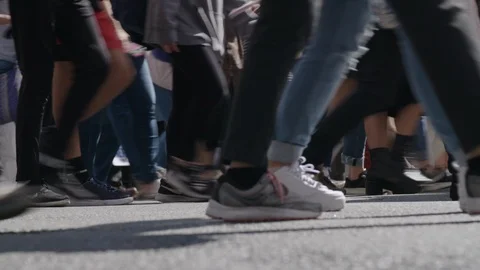 Close UP of protesters feet walking with Protest Signs Stock Footage 117898114
