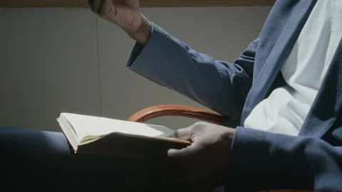 Close-up of Psychotherapist with Open Notebook Gesticulating and Talking Stock-Footage 289440580