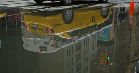 Close Up of Puddle With Reflection of the Iconic New York Skyscrapers Stock Footage 111867555