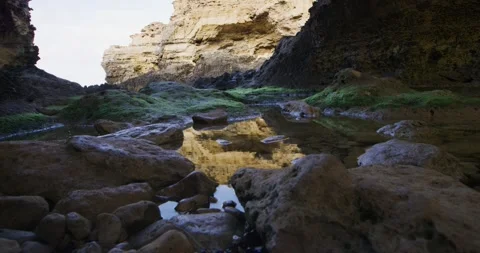 Close Up Of Puddle With Rocks Video stock 330241958