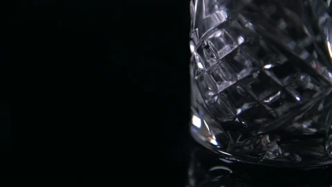 Close Pull Focus From Empty Traditional Whiskey Glass Stock Footage 140799416