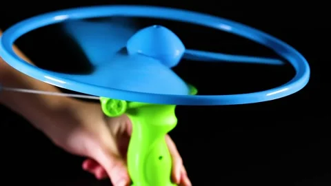 Close-Up of Pull String Toy Launch Sequence Stock Footage 308682030