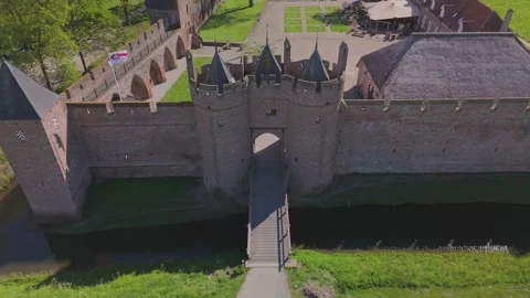 Close pullback reveal from Doornenburg Castle front gate Video stock 334318938
