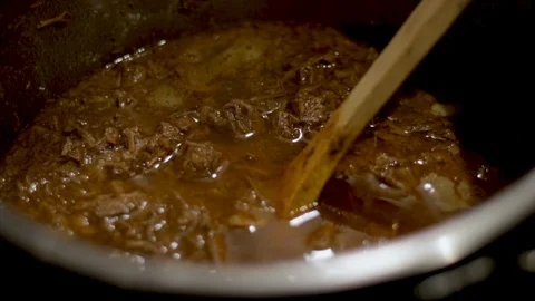 Close up pulled meat in a hot pot used for tacos. Delicious Mexican food recipe, Stock Footage 103221782