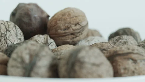 Close-up pulling focus on pile of walnuts 4K video Stock Footage 171590116