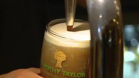 Close up pulling a pint in a gastropub Stock Footage 251434782