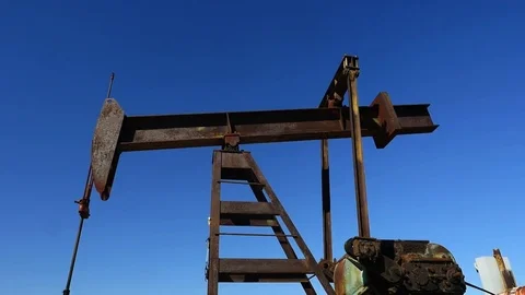 Close up of a pump jack at an oil well Stock Footage 77552507