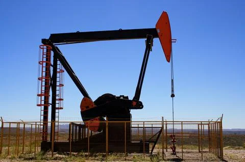 Close up pumping unit for oil extraction, Patagonia Argentina. Stock Photos