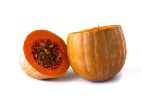 Close-up of a pumpkin, cut in two crosswise, on a white background. Foto stock