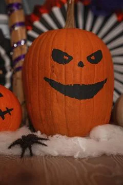 Close-up of pumpkin with painted Jack O' lantern face. Foto stock
