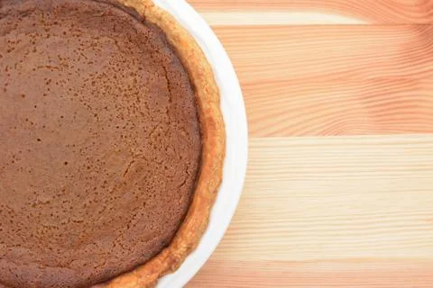 Close-up of a pumpkin pie on a table Stock Photos