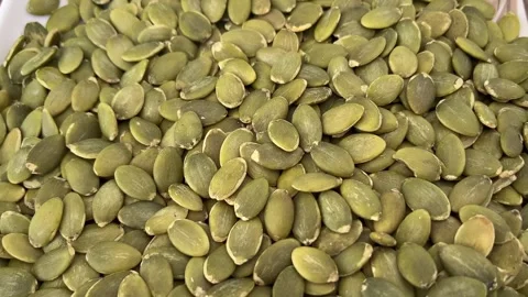 Close-Up of Pumpkin Seeds in 4K | Raw Seeds Видео 323270355
