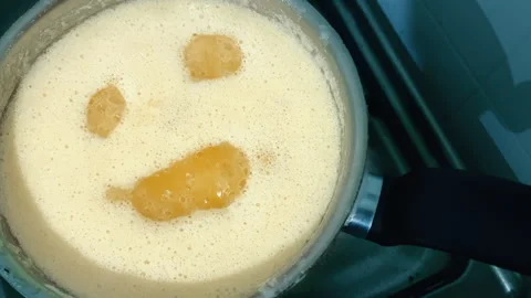 Close up of pumpkin soup boiling in the pot Stock Footage 289111760