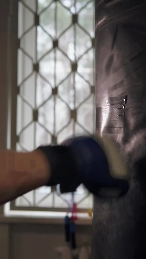 Close-up of a punch on a punching bag. Stock Footage 302275971