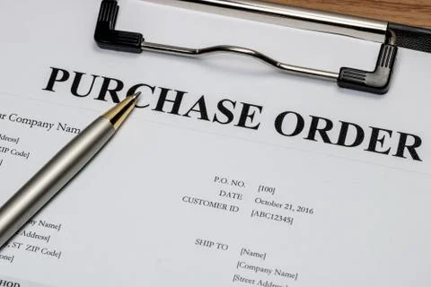 Close up of purchase order form with pen  / selective focus Stock Photos